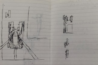Notebook pages of early robot and component sketches